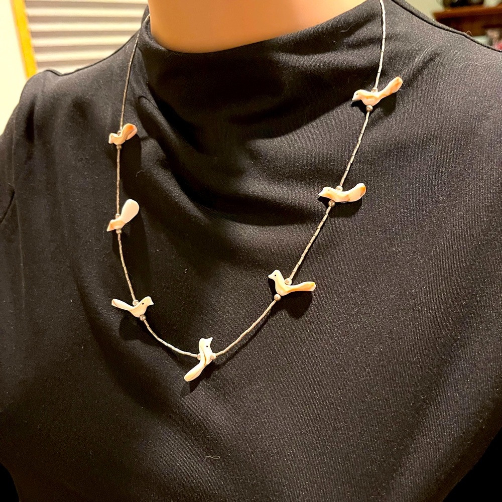 Coral birds on silver wire necklace